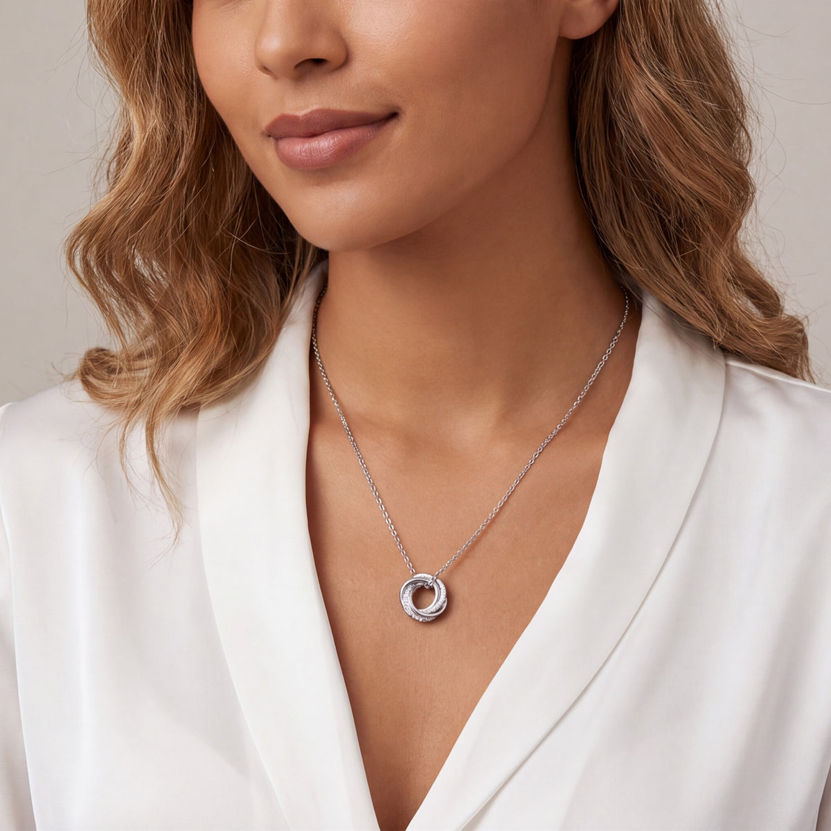 The Bond Necklace in silver and rose gold tone
